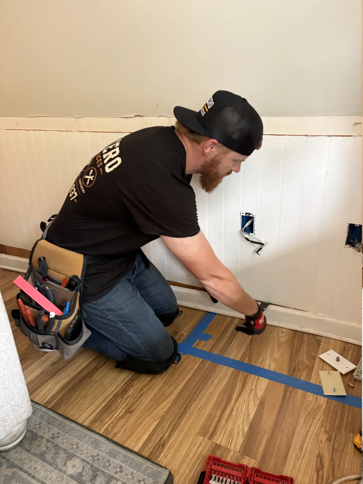 Careful baseboard and trim removal during an interior repair