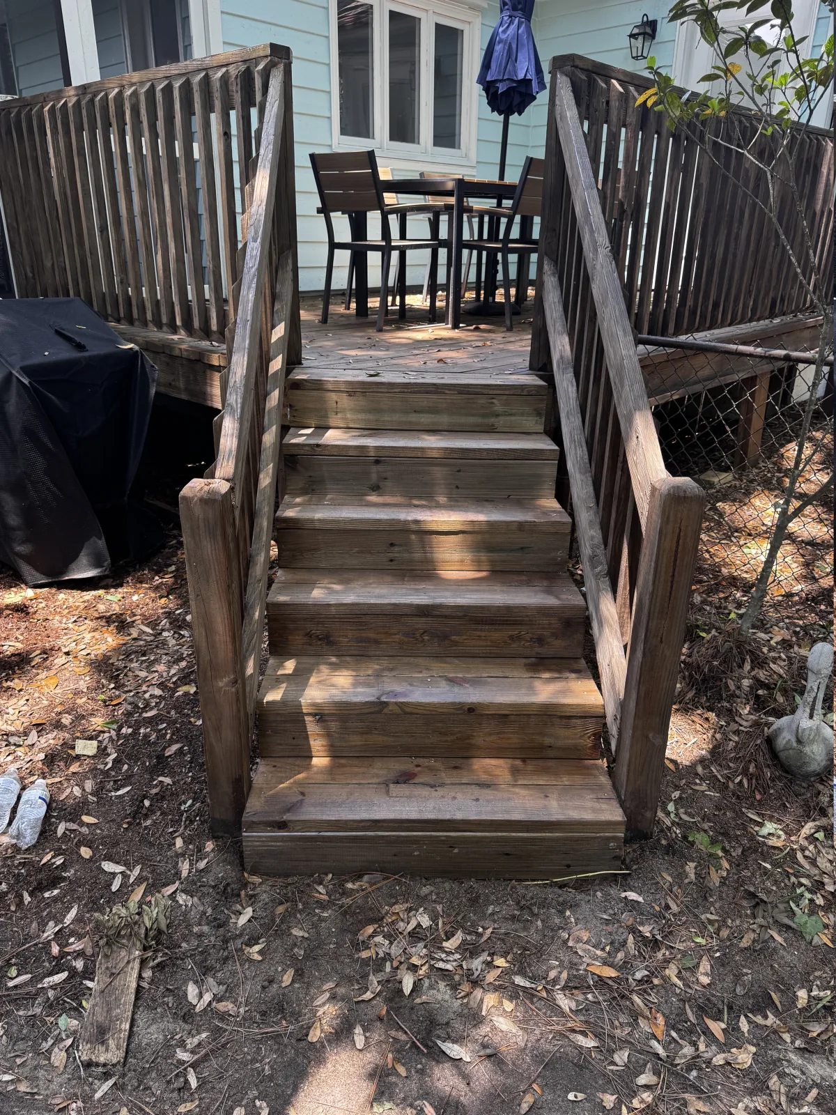Wood deck stairs after repairs and fresh stain